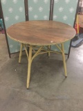 Vintage oak and wicker table.