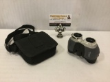 Small REI 321ft/1000yds binoculars w/carrying case, approx. 5x5x2 inches.