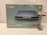 Canon CanoScan LiDE 35 color image scanner, unused in original box, approx. 18x12x4 inches.