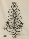 Twisting metal candle holder wall sconce, approx. 27x13x6 inches.