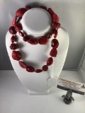 Red tone natural pit necklace, approx 32 inches long.