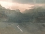 Framed photo print of a dark canyon