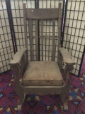Antique wooden oversized rocking chair with some age wear - see pics