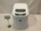 Igloo portable electric ice maker, approx. 12x13x9 inches.