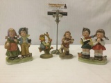4 faux-Hummel ceramic figurines from Taiwan & Hong Kong, largest approx. 6x4x2 inches.