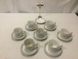 15 Japanese Fascino stoneware mugs & saucers, 7 cups & 8 saucers, w/ tasteful floral designs.
