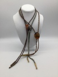 Collection of 3 bolo ties, arrowhead pattern and more.