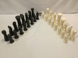 Set of ceramic chess pieces one with repaired base, and few with chips.
