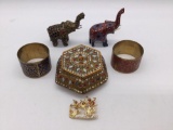 Indian & Eastern lot: beaded jewelry box, painted elephants, Siam style pin & 2 brass napkin ring