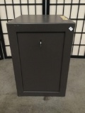 Unmarked small safe with key. Approx 18x14x12 inches