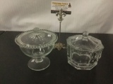 2 glass lidded candy dishes, incl. 1 w/ beaded rim glass lid & 1 thicker glass piece.