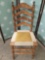 Vintage wood carved chair w/ rope/upholstered seat, approx 37 x 19 x 17 inches