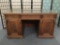 Antique style repo 3-drawer 2-cabinet desk w/ glass top, 3 keys, carved floral & lion designs