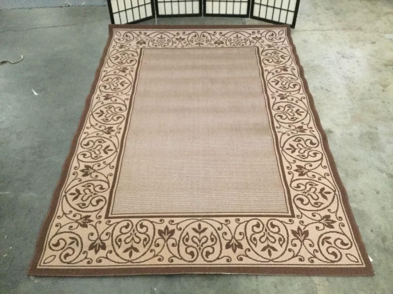 Earth tone rug w/ floral designs, approx. 90x63 inches.