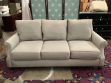 Modern gray KFI couch. Approx 84x42x36 inches.