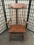 Vintage oak curved seat/arm rocking chair with sclloped seat and stick back