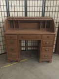 Vintage roll top desk, shows wear