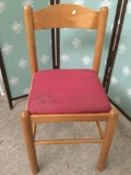 Wood chair w/ red upholstered seat, shows wear, approx 33x18x17 inches.