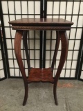 Antique 2 tiered end table or plant stand in flame mahogany - as is some wear
