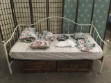 White metal day bed w/ pair of wheeled drawers