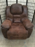 Brown leather overstuffed recliner in fair cond - well used