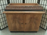 Wooden base cabinet piece w/ folding doors and floral detailing, missing top, SOLD AS IS