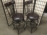 2 modern swiveling bar stools