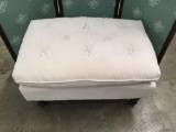 Modern white ottoman. Approx 28x20x16 inches.