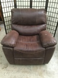 Brown leather style recliner, some very minor wear, see pics.