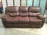 Brown leather style reclining couch, some minor wear