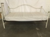 White metal frame twin size day bed. Approx 82x42x42 inches.