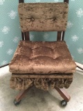 Vintage rolling office chair with velour style upholstery