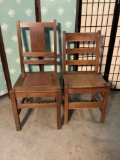Pair of antique mission style tiger oak chairs. Largest approx 39x21x18 inches.