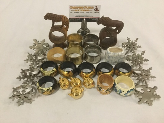 napkin rings / holders. Wood, metal, & ceramic. Snowflakes, animals, buildings