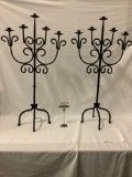 Pair of matching wrought iron candle holders