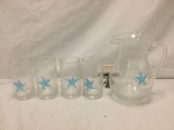 Set of pulegoso glass drink ware with starfish motif.