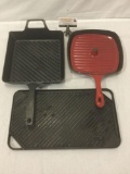 3x cast iron cookware, red glazes pan, and 2 griddles, one Bobby Flay brand