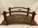 Vintage wood garden bridge decoration. Charming mini-sized bridge for your yard.