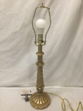 Modern composite base table lamp.