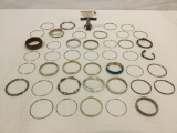 Large assortment of various womens cuff bracelets - see pics and desc