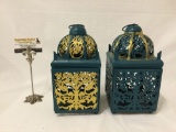 Pair of metal hanging candle holders, partially hand painted