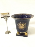 Vintage porcelain gold tone footed courtship vase, has chip on rim, approx. 8 x 8 inches.