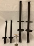 Two pairs of metal wall mounting candle holders