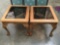 Pair of tinted glass top wood end tables. Approx 27x24x20 inches.