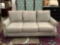 Modern gray KFI couch. Approx 84x42x36 inches.