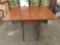 Vintage drop leaf wood kitchen table, approx 42 x 52 x 30 inches