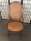 Vintage wood rocking chair with woven seat and back