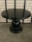 Large black round walnut Pottery Barn parlor table. Approx 40x40x31 inches. Matches previous lot.