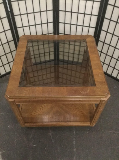 Vintage glass top coffee table, shows wear.