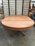 Antique oak round kitchen table with two leaves